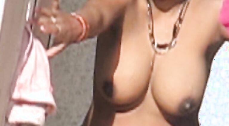 Mumbai bhabhi caught by long distance camera changing after shower.