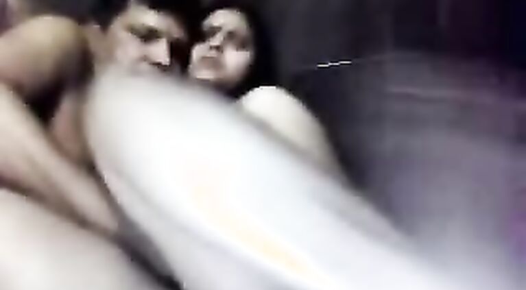 riding her hubby condom covered cock in this MMS