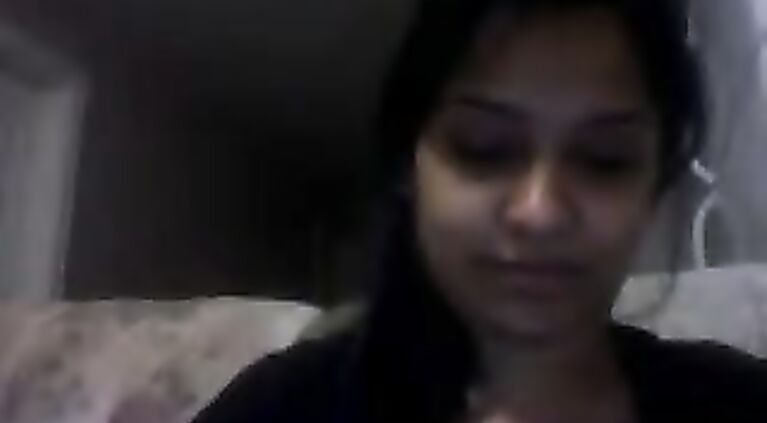 Sweet Noida girl Angel sitting naked on webcam pressing her boob and fingering her hairy pussy.