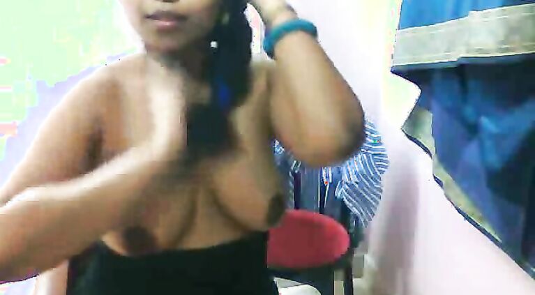 Busty desi babe Lilly in blue shirt and in stockings doing a self recorded strip show l1eaked online!.