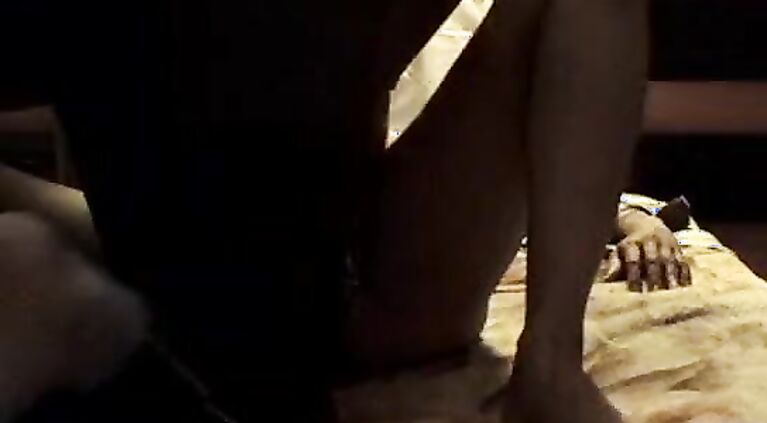 Sexy newly wed indian wife showing cleavage and legs in bed before sex session and her partner shooting her in this MMS.