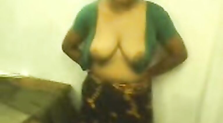 Bhabhi Opening Her Blouse - Movies.
