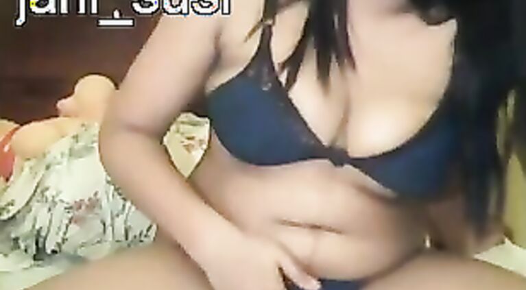 Odissa guy eating in bed while his wife joins in with blue petticoat wrapped around her naked body