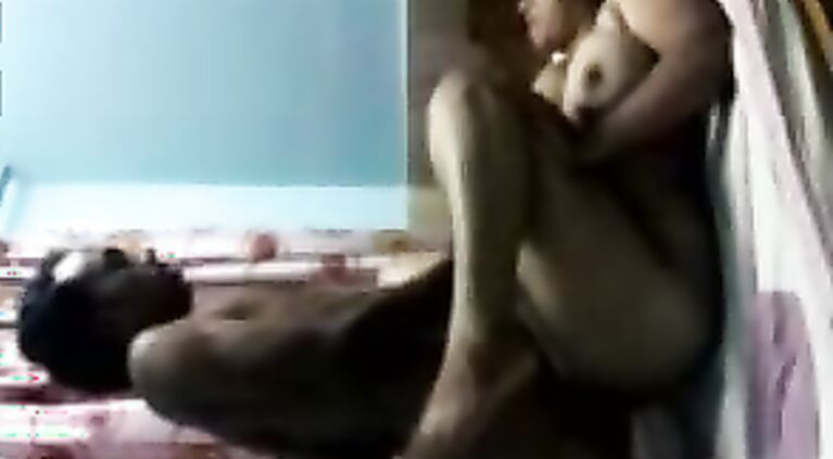 Desi bhabhi in kameez hiked up and juicy big boobs exposed and pressed by tharki dewar who also pulls down her salwar to show her ass cheeks and caresses them in this MMS.