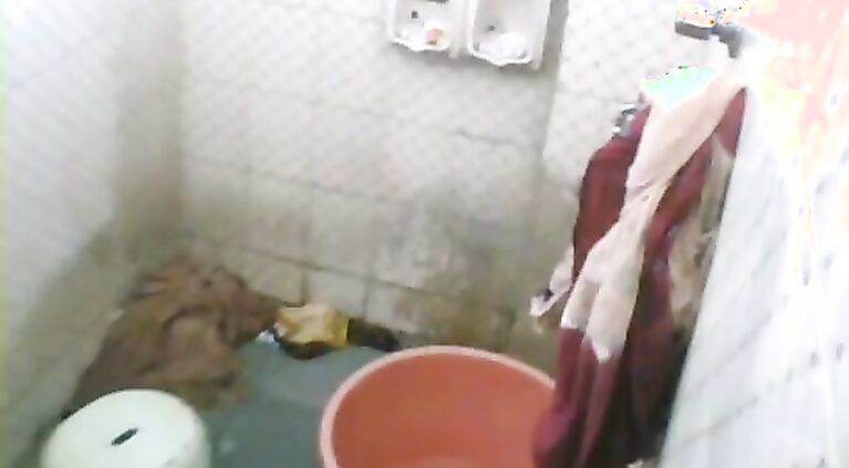 Indian housewife free from her daily household work taking shower on weekend unaware that her man fixed a hidden cam to record her hot shower. video2porn2
