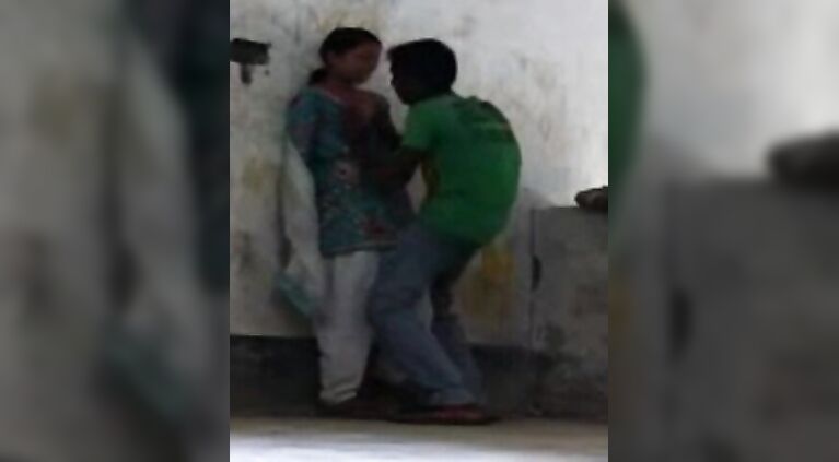 Patna, Bihar high school girl in coaching center roof after class with her boyfriend who passionately kissed her and pressing her juicy boob!.