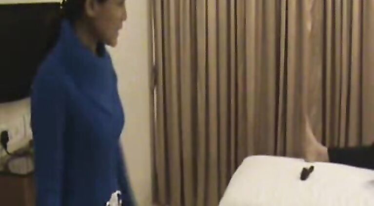 Indian wife on honeymooon trying different lingerie in front of her husband in hotel room who is filming her naked!. video2porn2