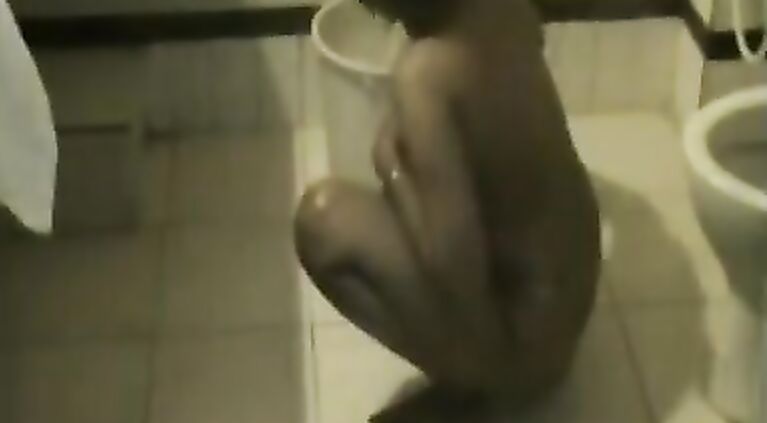 Sexy Pakistan housewife Azra Bano in lounge stripping naked and caught taking shower.