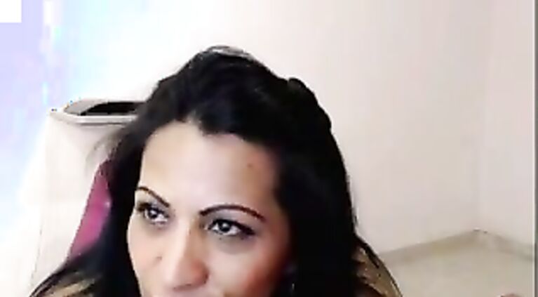 Indian housewife is masturbating like a cam girl.