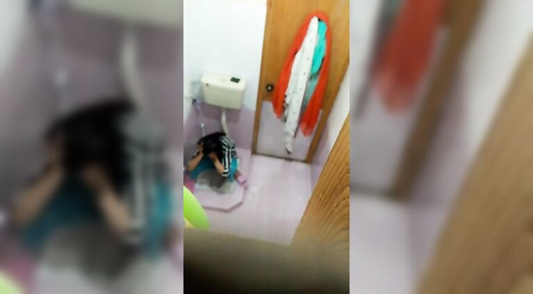 My cousin getting pee in washroom
