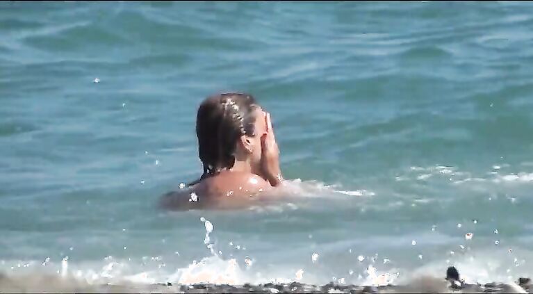 Huge boobs woman playing with dick on nude beach.wmv