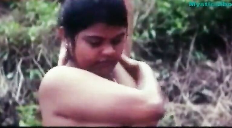 mallu aunties taking bath in public watched by a man hiding