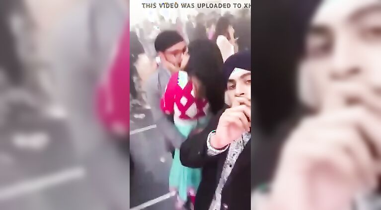 punjabi boys having fun with a girl in public