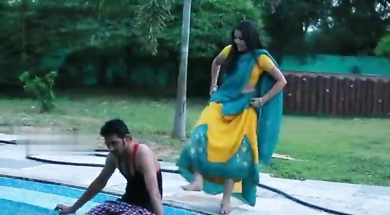 Lovers beautiful romance in swimming pool