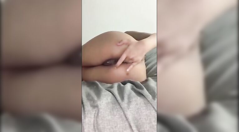 Indian/British slut fingering her ass hole and fucking her cunt with a fatty 8" vibrator! lots of moaning