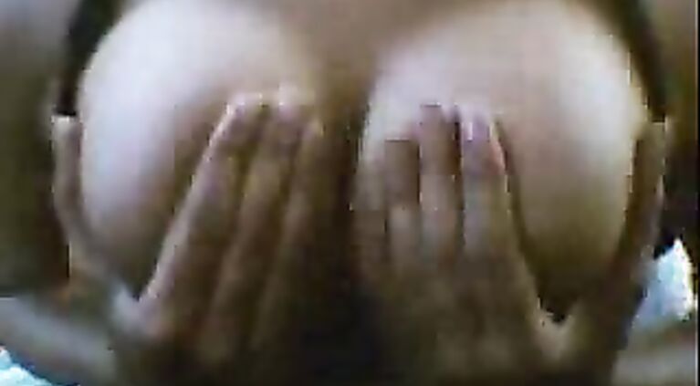 Sexy Housewife showing her sexy boobs and masturbating.